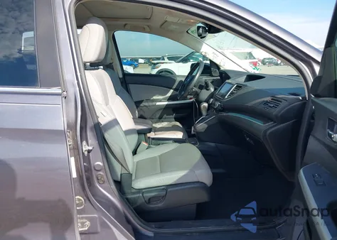 2015 Honda Cr-V Touring z USA, uszkodzony, nr VIN 5J6RM3H94FL020849